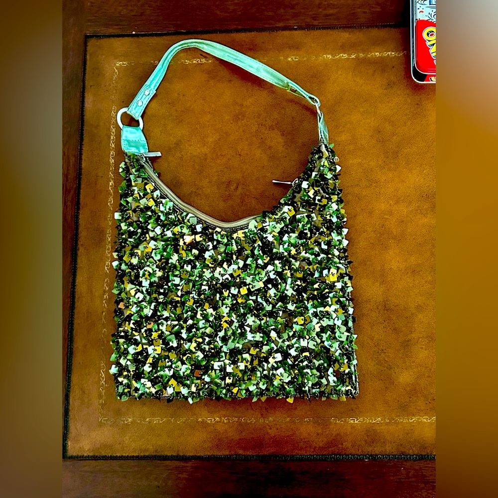 Nicole Lee sequin sparkly purse. Green good condition  inside zipper pocket